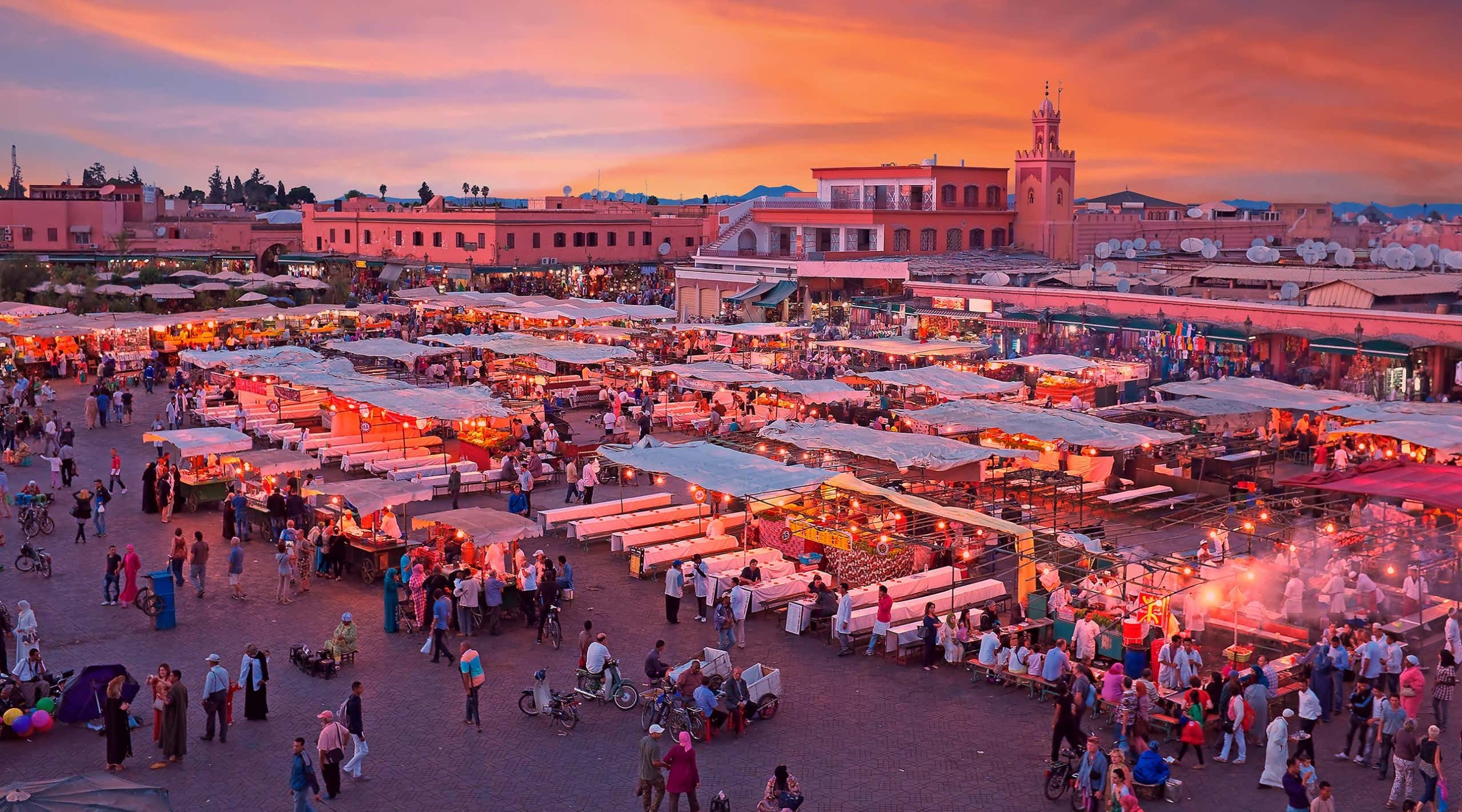 Evening on Djemaa El Fna Square with Koutoubia Mosque, Marrakech, Morocco
