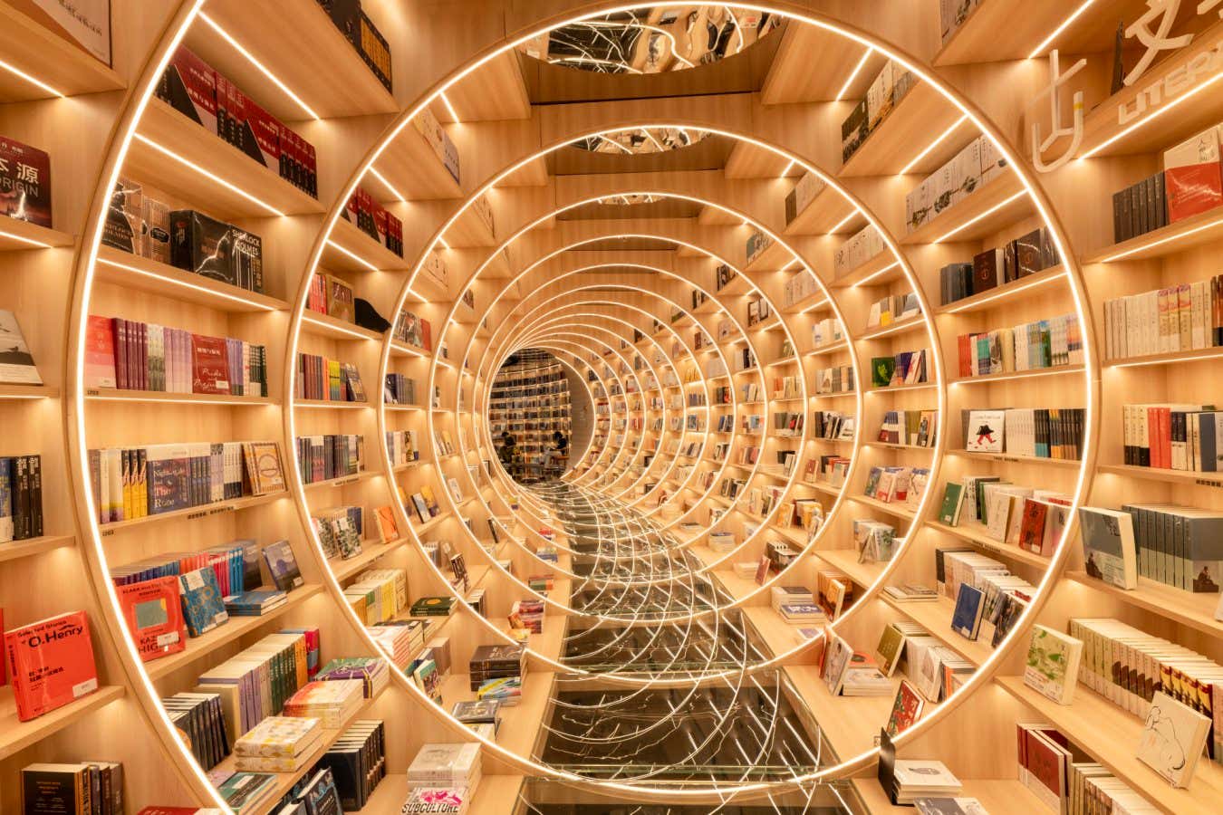 Visitors read books at the Yuishin Bookstore