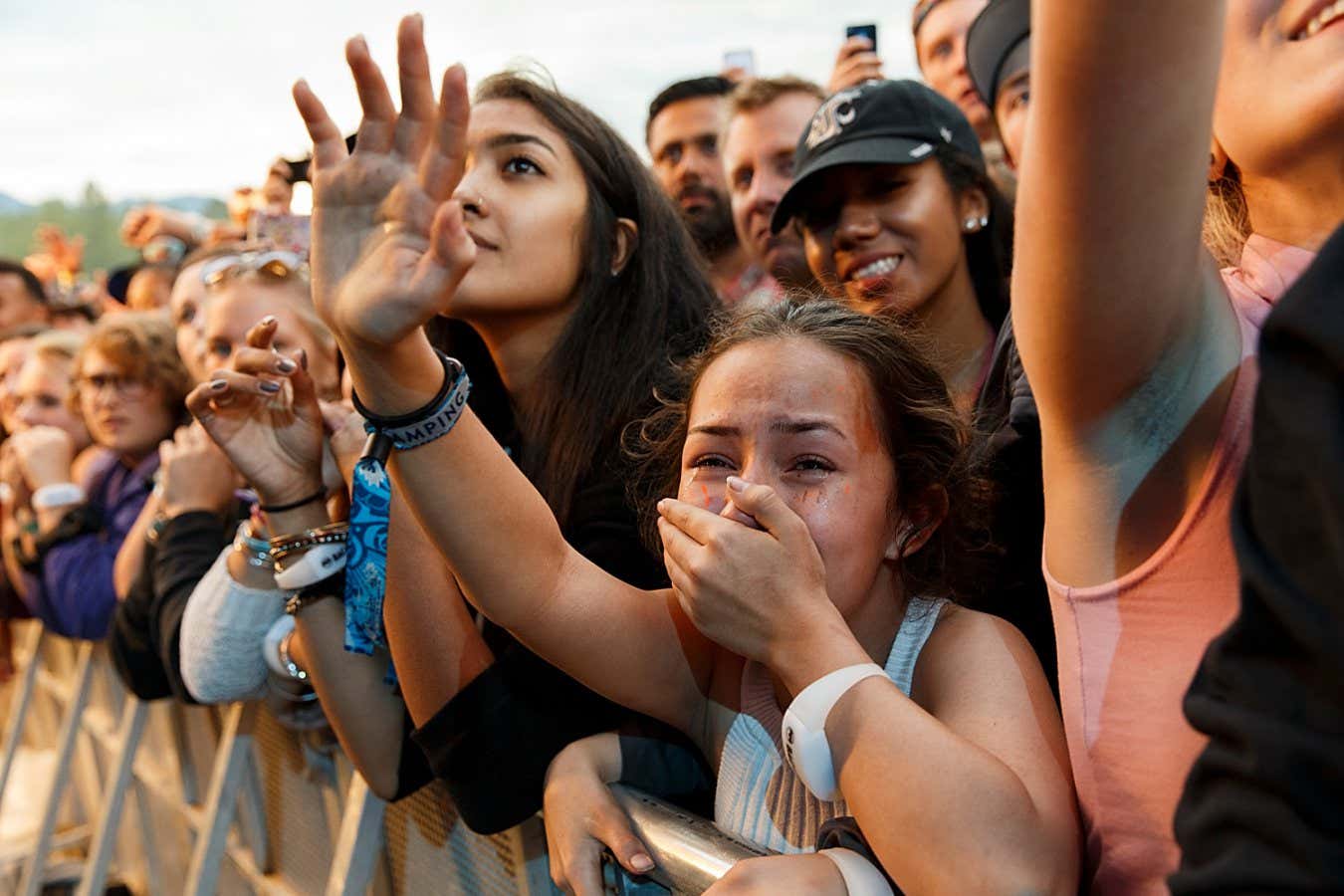 PEMBERTON, BC - JULY 15: A music fan cries during J. Cole's performance onstage during day 2 of Pemberton Music Festival on July 15, 2016 in Pemberton, Canada. (Photo by Andrew Chin/Getty Images )