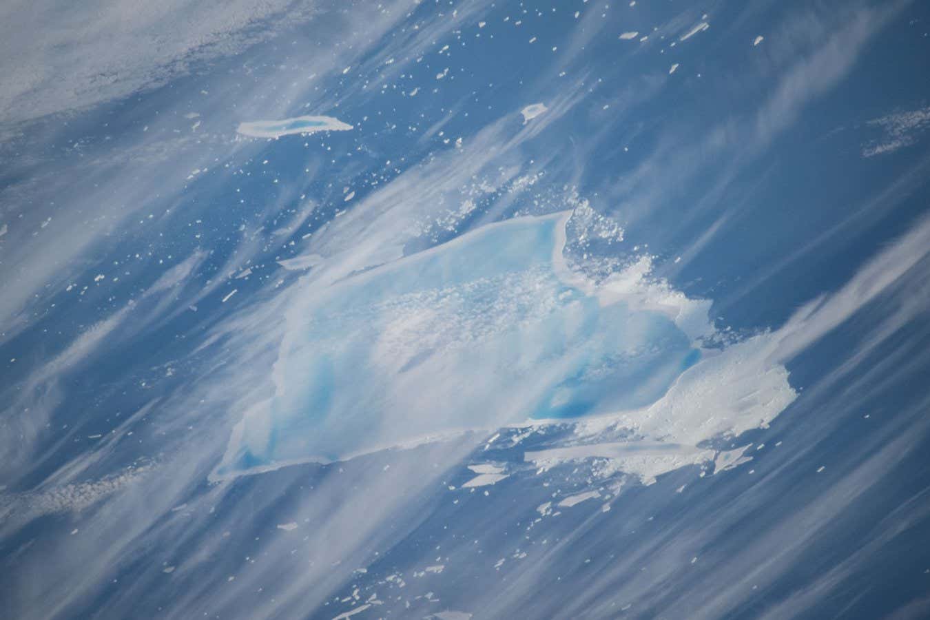 GMT361_22_14_Chris Williams_Day_Southern Chile and Iceberg_50-500 Photo of Iceberg A23-A taken from ISS on 27/12/2025.