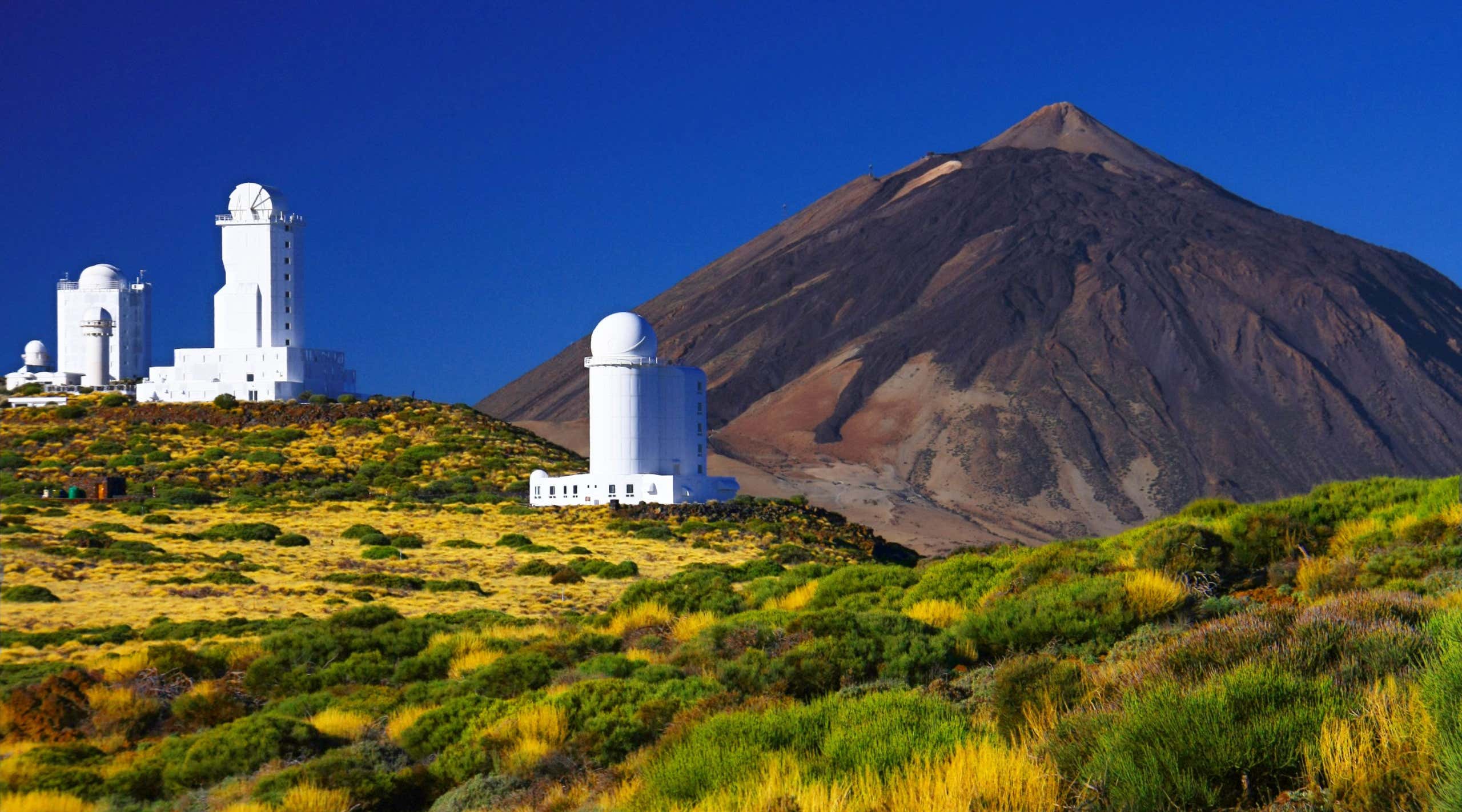 Teide Observatory - scientific astronomical telescope with Teide mountain in background, Tenerife island, Spain