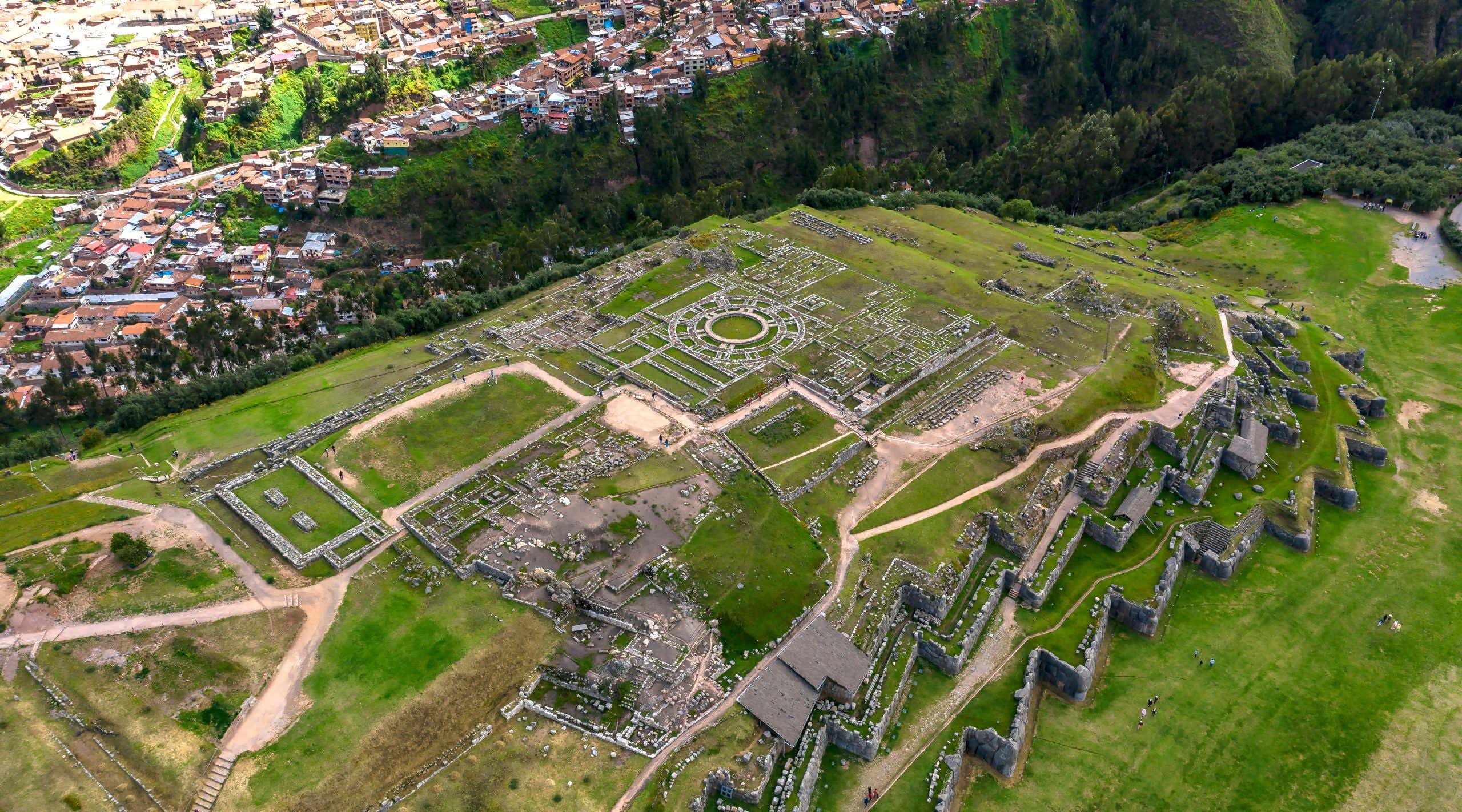 Aerial top view of the inca ruins of Sacsayhuaman on the outskirts of Cusco, Peru. Archaeological site of ancient Incan citadel.