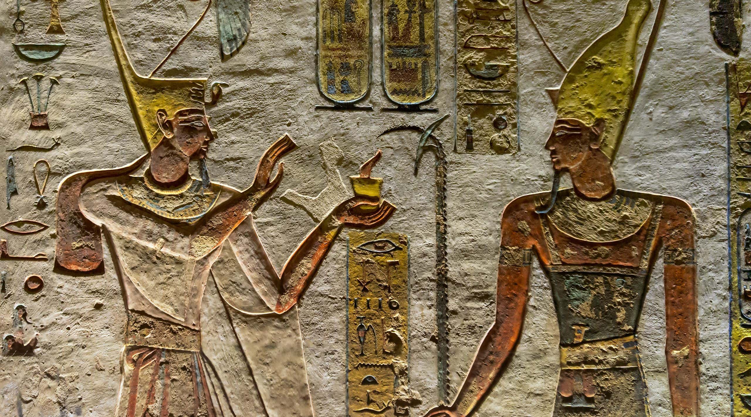ancient colour Egypt images and hieroglyphics on wall